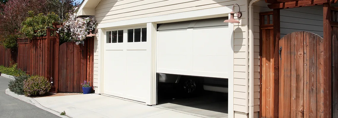 Fix Metal Garage Door Jerking in Normal, Illinois